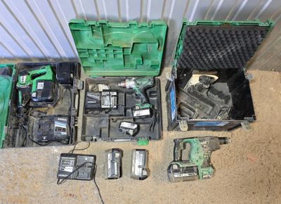 a lot of tools that are laying out on the floor