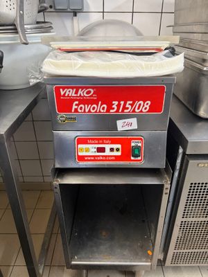 a machine that is sitting on a counter in a kitchen