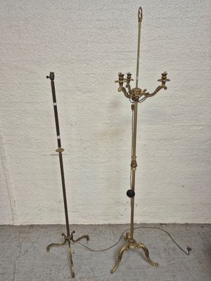 pair of antique brass candlesticks on stands
