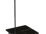 a black table with a green umbrella on it