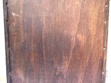 a picture of a wooden picture frame on the wall