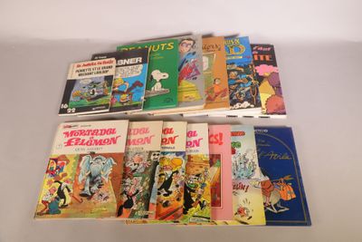 several children ' s books are lined up on a white surface