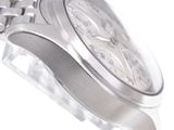 a close up of a watch on a white background