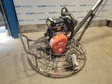 an image of a concrete floor polisher in a garage