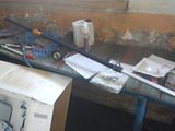 an image of a desk with a bunch of tools on top of it