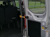a van with the door open on the side of the road
