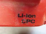a close up of a red object with the word li - ion on it