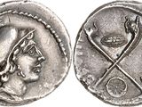 a close up of a silver coin with a woman on it