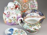 three chinese porcelain dishes and a cup and saucer
