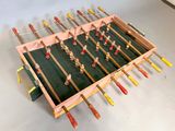 a foo foo foo table made out of wood and plastic
