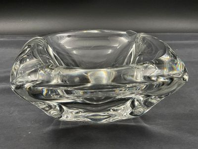 a clear glass bowl with a design on the inside of it