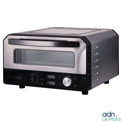 une image d'un grille-pain four sur fond blanc