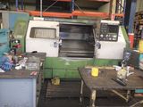 a large machine that is sitting in a factory