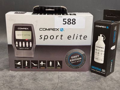 a box with a bottle and a cell phone in it