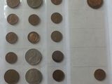 a lot of coins in a plastic bag on a table