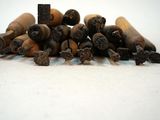 a pile of cigarettes sitting on top of a white table