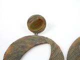 pair of green and brown earrings on white surface