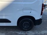 a white van that is parked in a parking lot