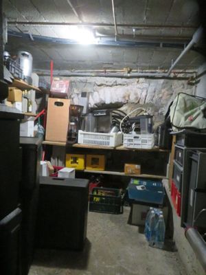 an image of a basement with a lot of clutter
