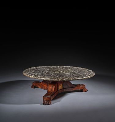 a marble top table on a wooden stand with a black background