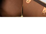 an image of the inside of a brown and tan bag