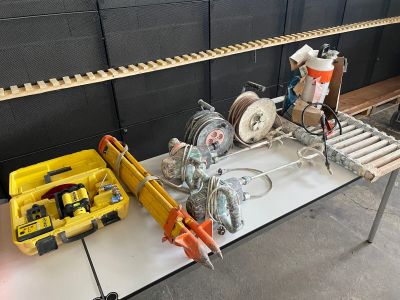 a table that has a lot of tools on it