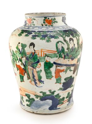 a vase with a painting on it on a white surface