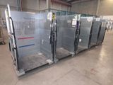 many glass doors in a warehouse with pallets on the floor