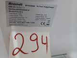 a white refrigerator with a price tag on it