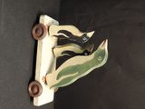 a toy of a shoe that is attached to a wall