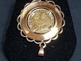 a gold coin in the middle of a black case