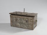 an old wooden box with a latch on the top