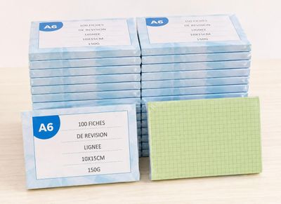 a stack of business cards sitting on a table