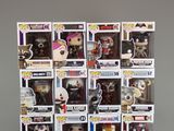 a bunch of pop vinyl figures in a display case