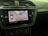 the interior of a car with a camera mounted to the dash