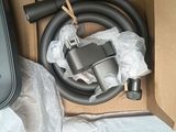 a box that has a hose and a hose in it