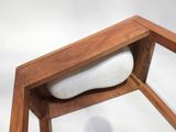 a wooden shelf with a white object in it