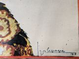 a picture of a painting of a cat on the wall