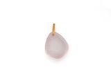 a close up of a pink stone pendant on a white background