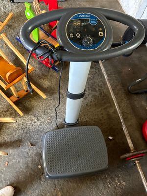 a machine that is sitting on the floor in the garage
