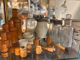 a glass display case with many different items in it