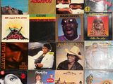 a lot of records that are on the table