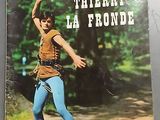 la photo d'un livre sur lequel figure la photo d'un homme