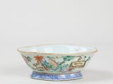 a close up of a bowl on a table with a white background