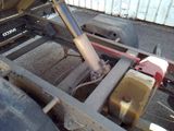 a close up of a truck with a flat bed on the back of it