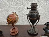 many different types of vases on a table