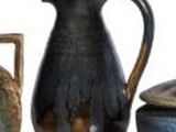 several different types of vases are displayed on a white surface