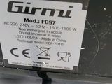 a label on the back of a laptop that says garmin