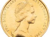 an image of a close up of a gold coin with a woman ' s face
