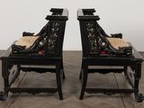 pair of antique black painted chairs with upholstered seats